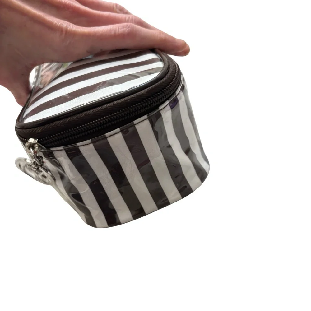 Henri bendel white & brown striped cosmeti case bag.